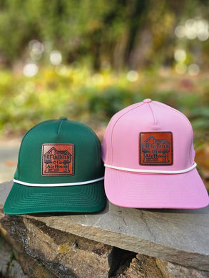 Green and Pink McGillin's Leather Patch hats with rope. Dri Fit material