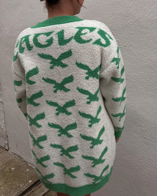White fleece cardigan with green eagle patterns 