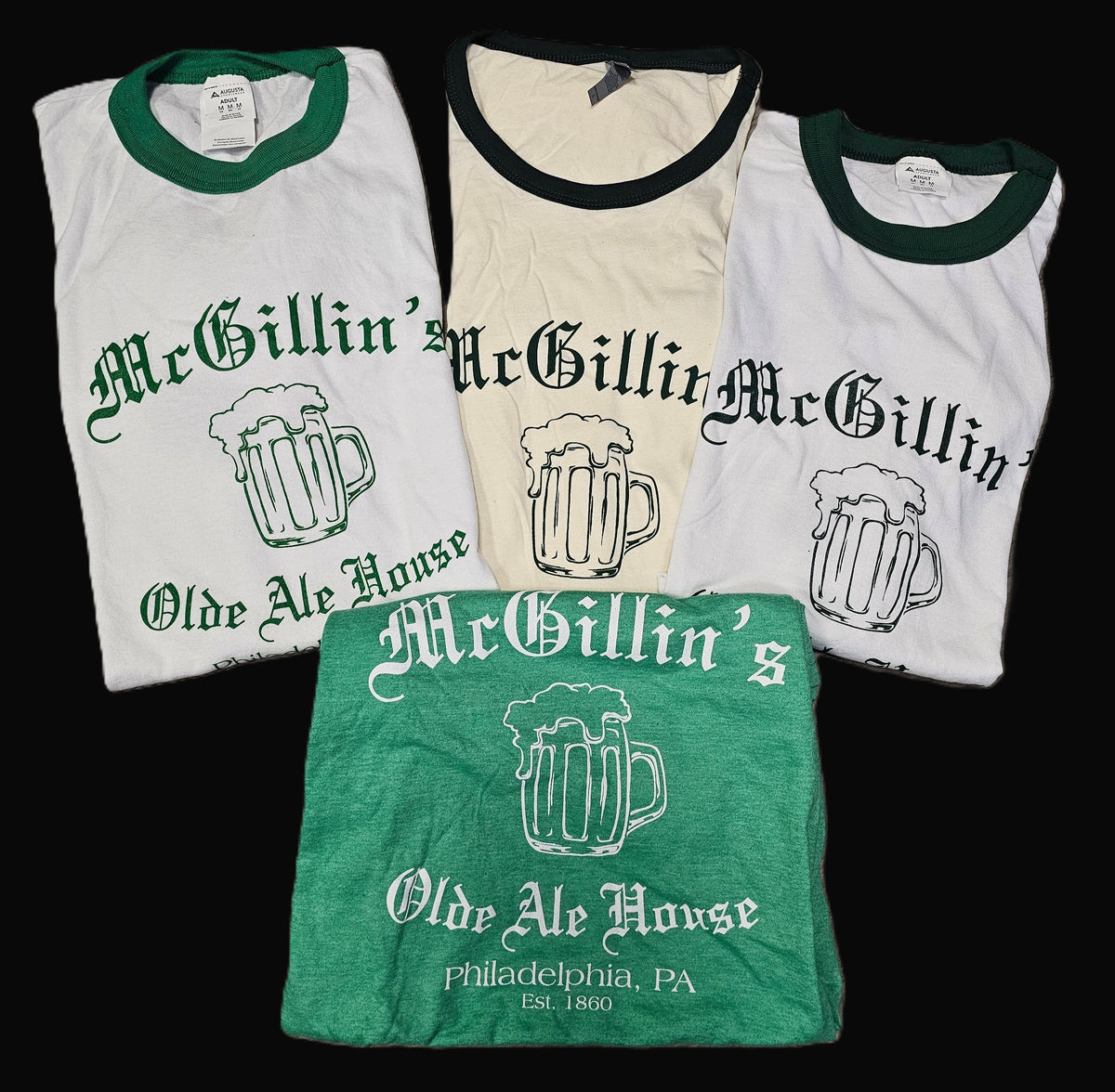 Four t-shirts with 'McGillin's Olde Ale House' branding 