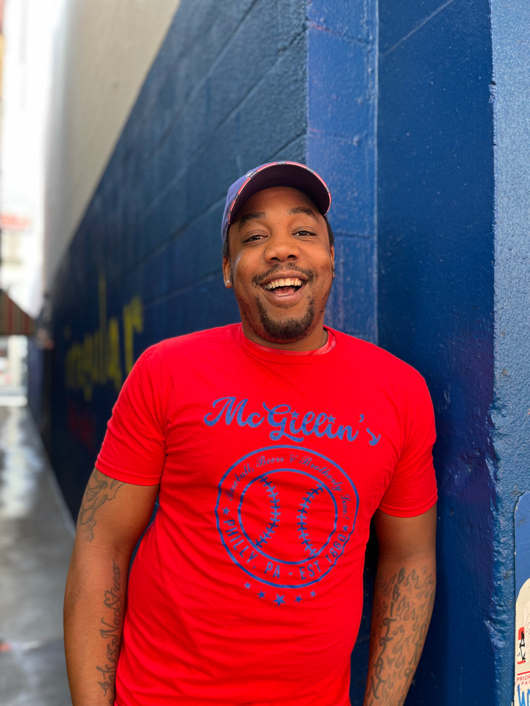  red t-shirt with 'McGillin's' print
