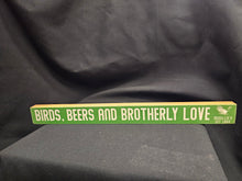 Wooden sign with text 'Birds, Beers and Brotherly Love' 