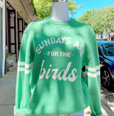 Green sweater with Birds text